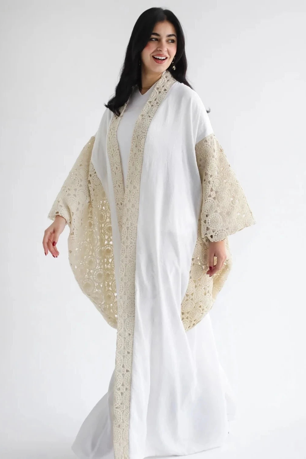Kaftan en lin brodé et drapé